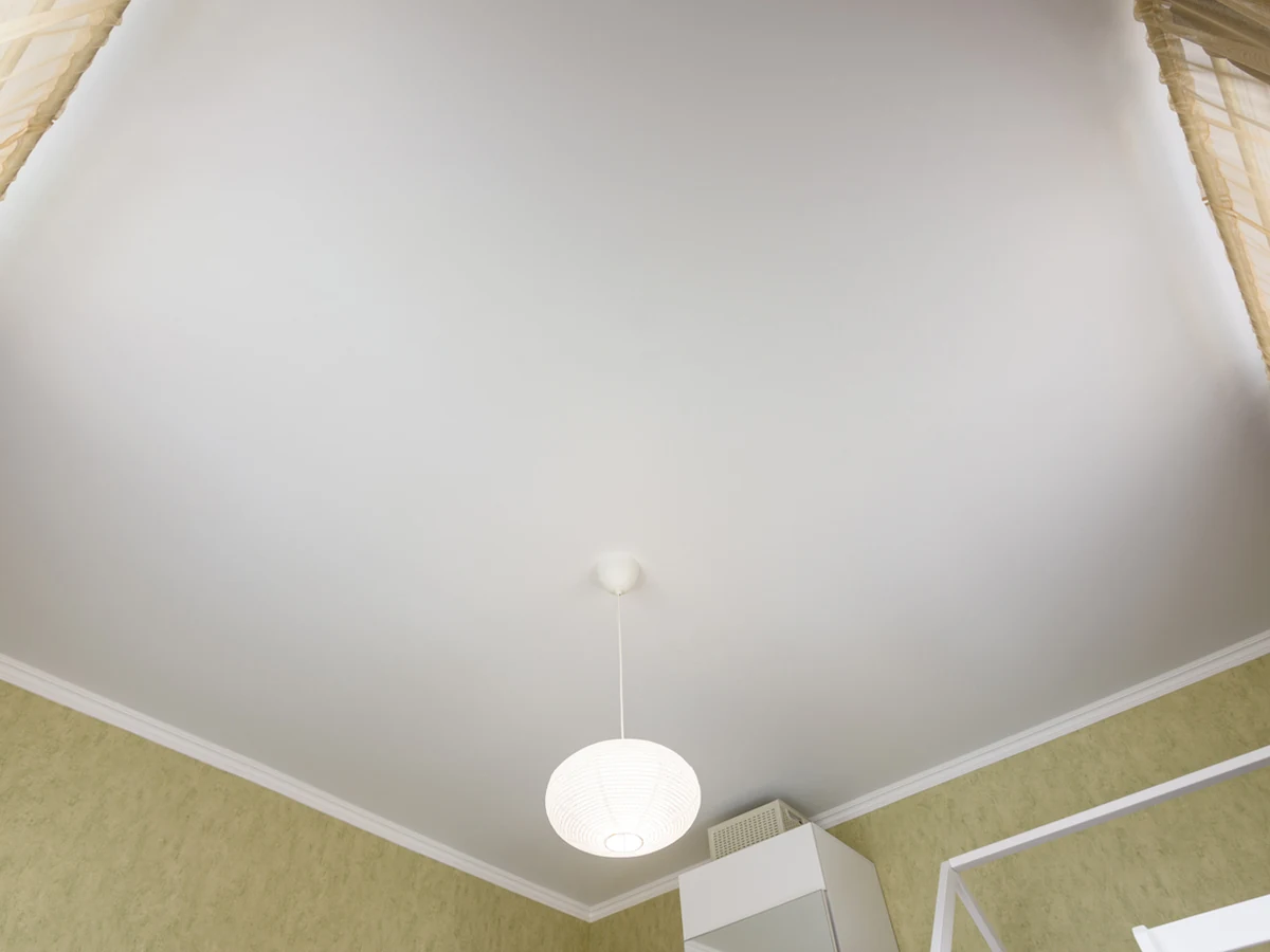 White matte ceiling freshly painted by Haywards Heath Decorators with even coverage