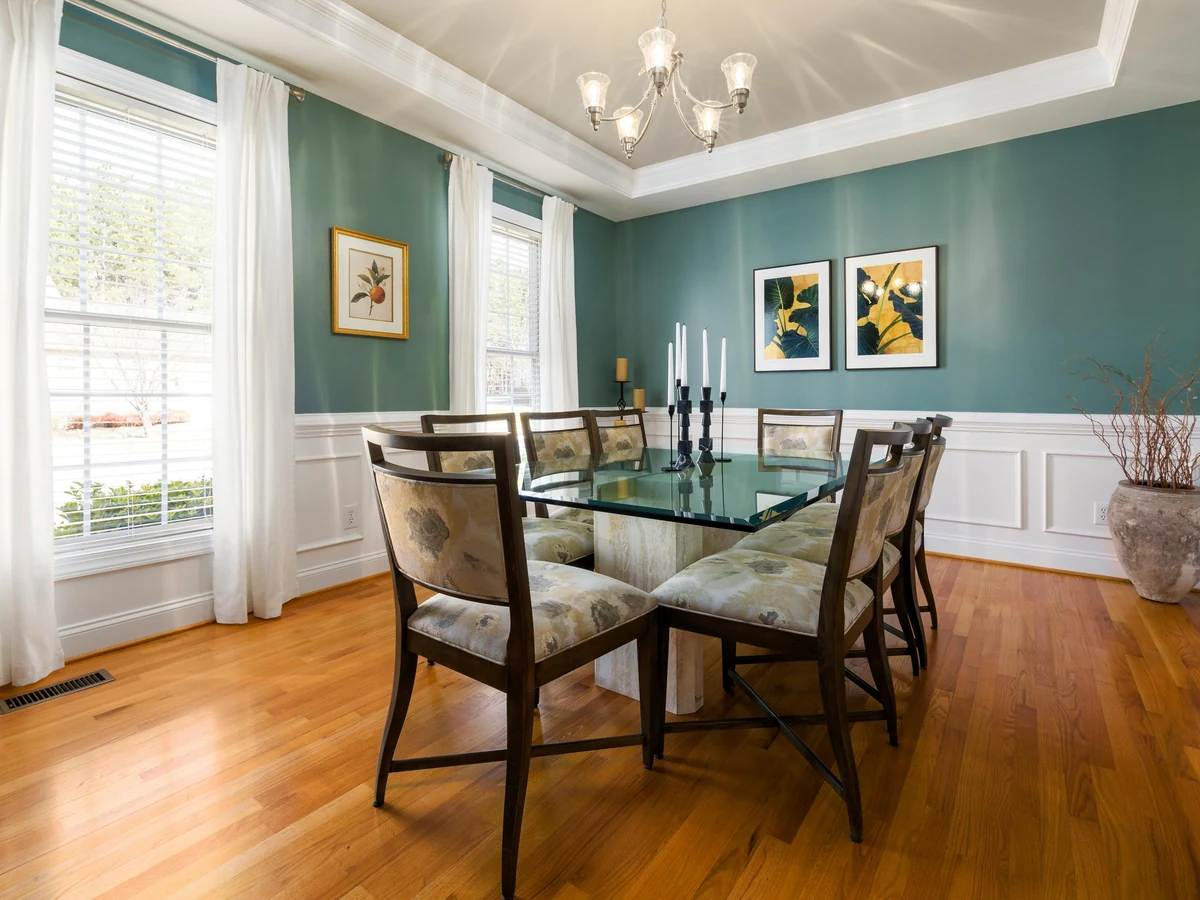 Teal wainscoted dining room painted by Haywards Heath Decorators with period detail