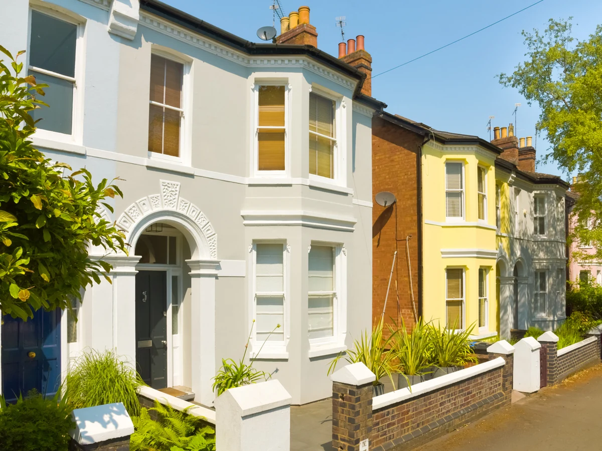 Colourful Victorian terraced front doors painted in Haywards Heath