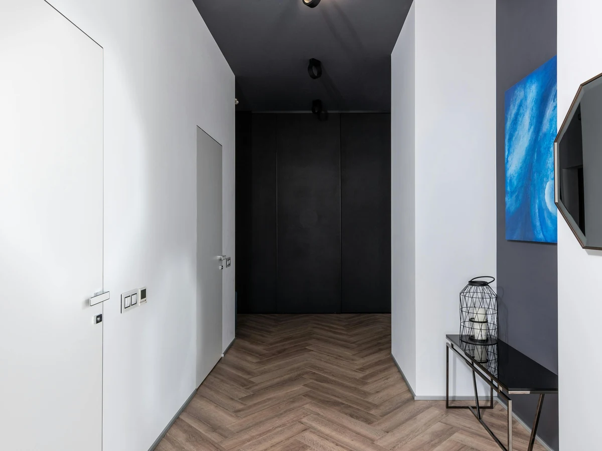 Minimalist dark hallway painting in Haywards Heath