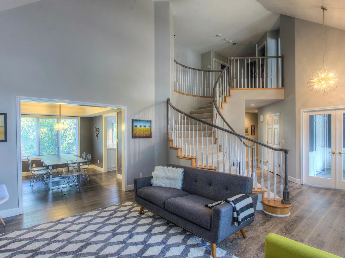 Panoramic view of painted staircase and hallway in Haywards Heath