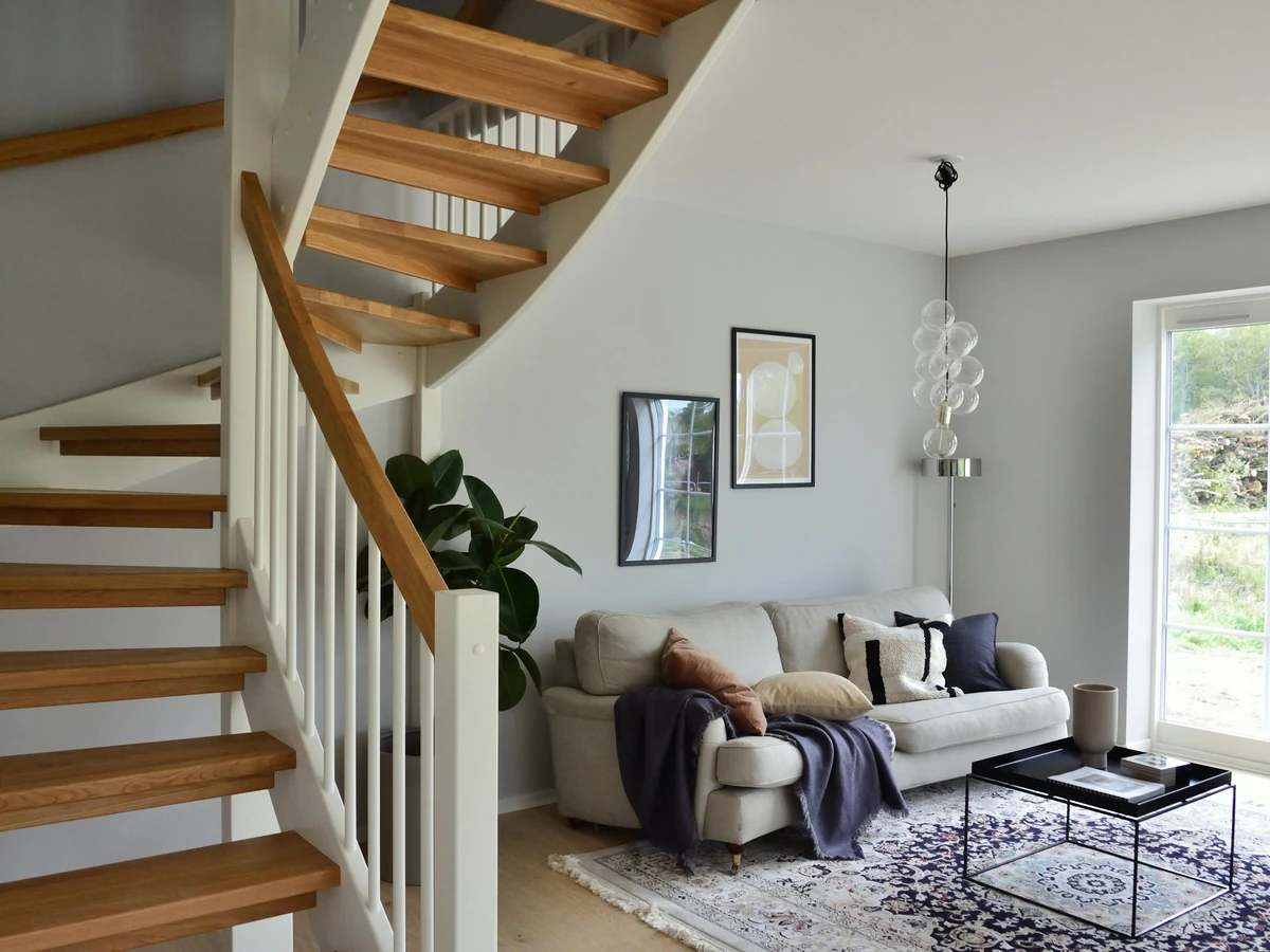 Varnished open tread staircase painting in Haywards Heath